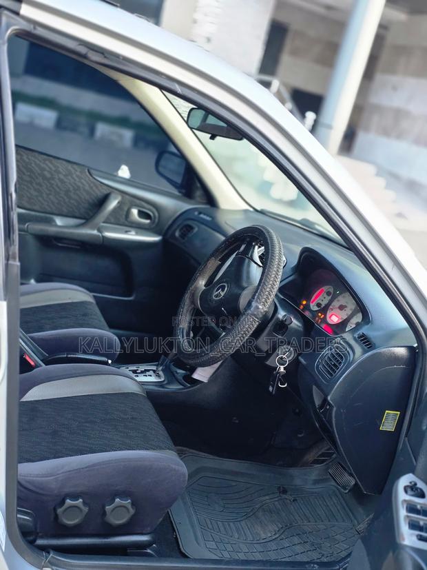Mazda Familia 2000 Silver