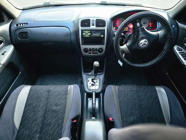 Mazda Familia 2000 Silver