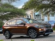 BMW X1 xDrive28i AWD 2016 Brown for sale