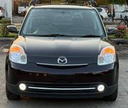 Mazda Verisa 2009 Maroon for sale
