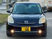 Mazda Verisa 2010 Maroon for sale