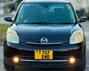 Mazda Verisa 2010 Maroon for sale