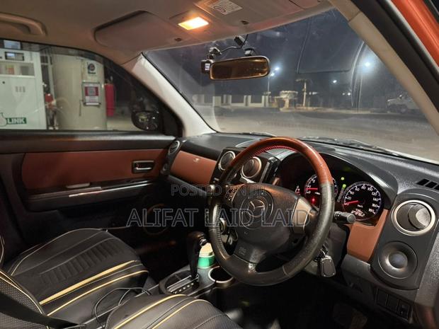 Mazda Verisa 2010 Red