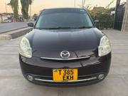 Mazda Verisa 2010 Maroon for sale