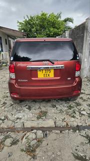 Toyota Corolla Rumion 2010 Maroon for sale