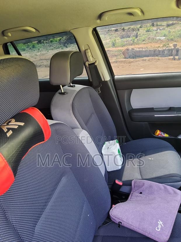 Mazda Verisa 2009 Burgundy
