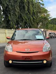 Mazda Verisa 2009 Orange for sale