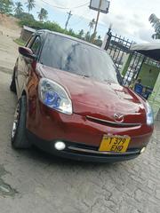 Mazda Verisa 2011 Maroon for sale