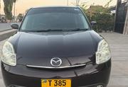 Mazda Verisa 2010 Maroon for sale