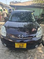 Mazda Verisa 2010 Maroon for sale