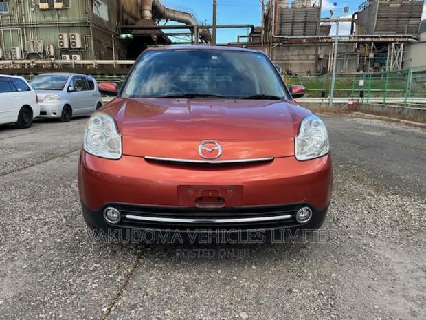 Mazda Verisa 2009 Red