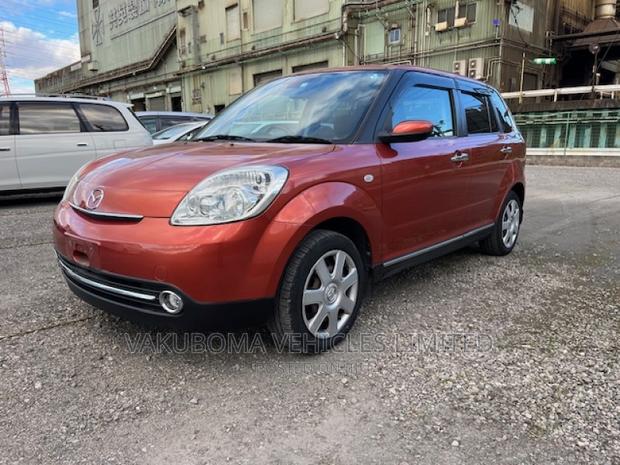 Mazda Verisa 2009 Red