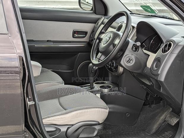 Mazda Verisa 2010 Burgundy