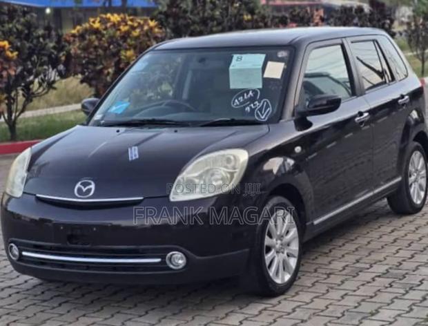 Mazda Verisa 2009 Burgundy
