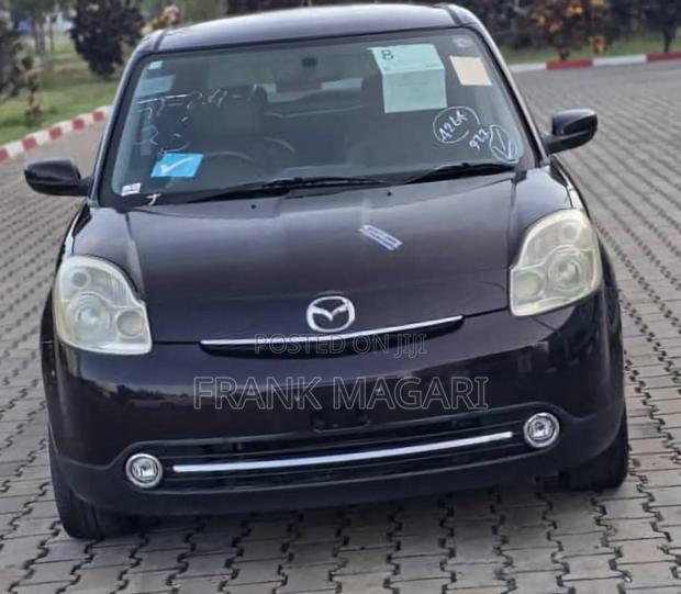 Mazda Verisa 2009 Burgundy