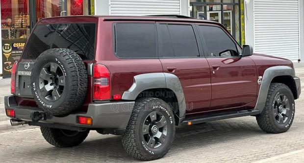 Nissan Patrol 2013 Burgundy