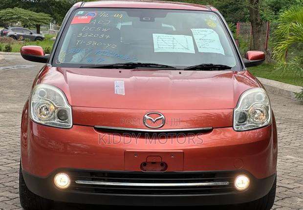 Mazda Verisa 2009 Red