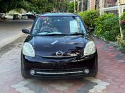 Mazda Verisa 2010 Burgundy for sale