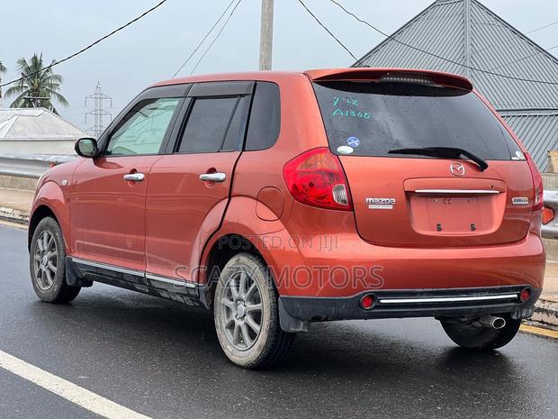 Mazda Verisa 2009 Orange