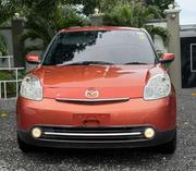 Mazda Verisa 2009 Orange for sale