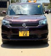 Toyota Corolla Rumion 2011 Maroon for sale
