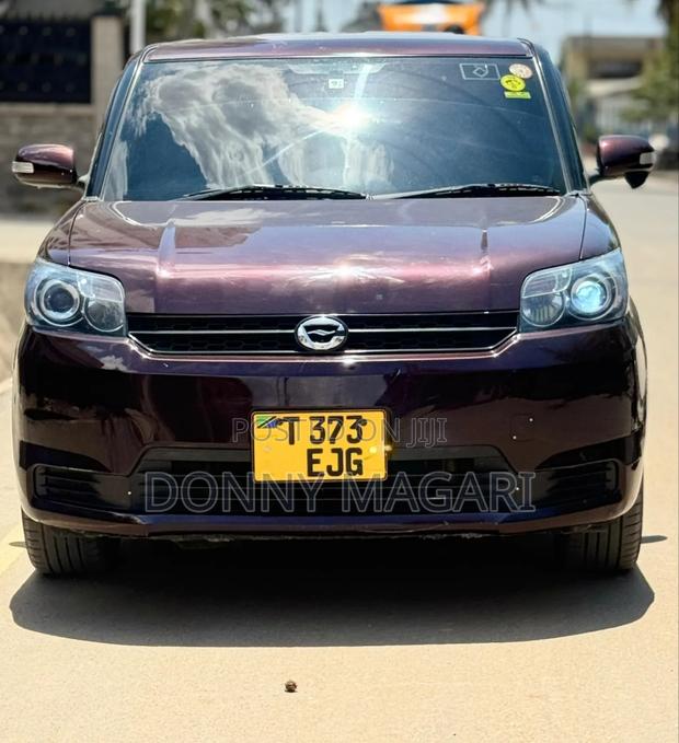 Toyota Corolla Rumion 2011 Maroon