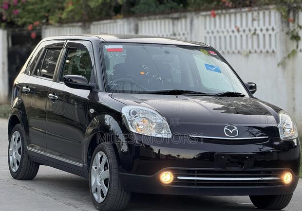 Mazda Verisa 2009 Burgundy