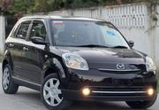 Mazda Verisa 2009 Burgundy for sale
