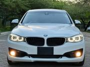 BMW 320i Sedan RWD 2014 Burgundy for sale
