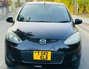 Mazda Demio 2009 Burgundy for sale