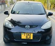 Mazda Demio 2009 Burgundy for sale