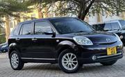 Mazda Verisa 2010 Maroon for sale