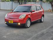 Mazda Verisa 2010 Maroon for sale