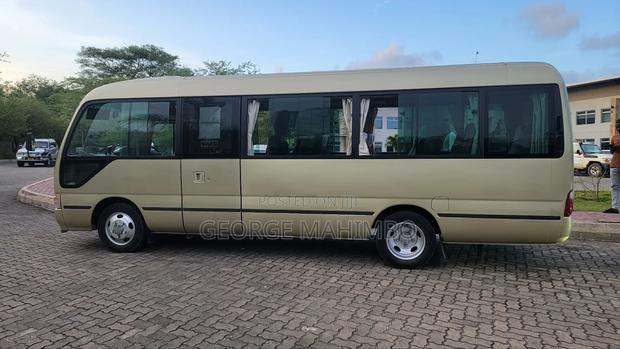 Toyota Coaster 2003 Gold