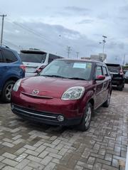 Mazda Verisa 2011 Maroon for sale