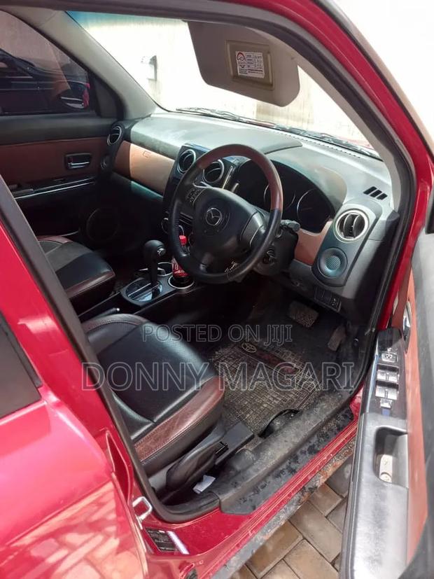 Mazda Verisa 2010 Red