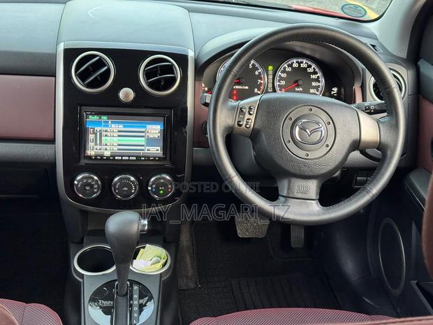 Mazda Verisa 2010 Red