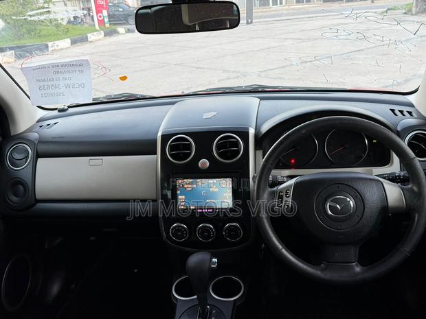 Mazda Verisa 2011 Red