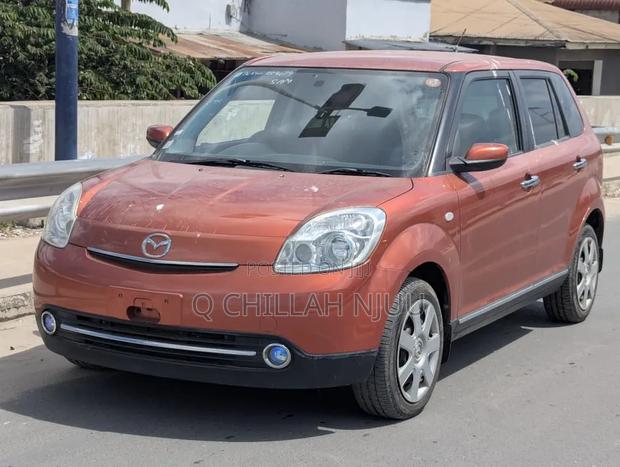 Mazda Verisa 2009 Red