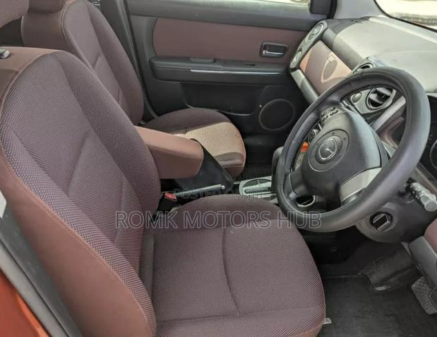 Mazda Verisa 2009 Red