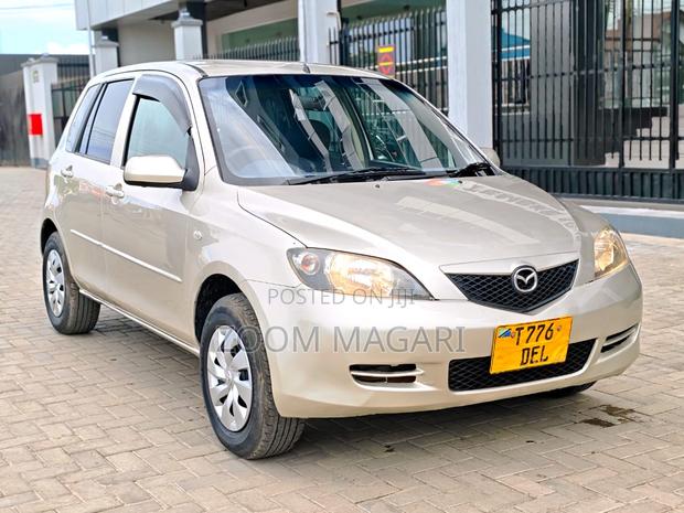 Mazda Demio 2009 Beige