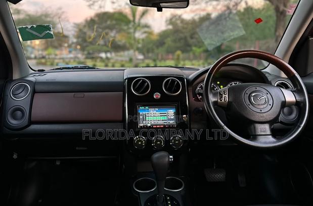 Mazda Verisa 2010 Orange