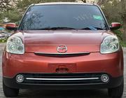Mazda Verisa 2010 Orange for sale