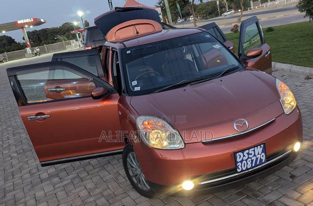 Mazda Verisa 2013 Maroon