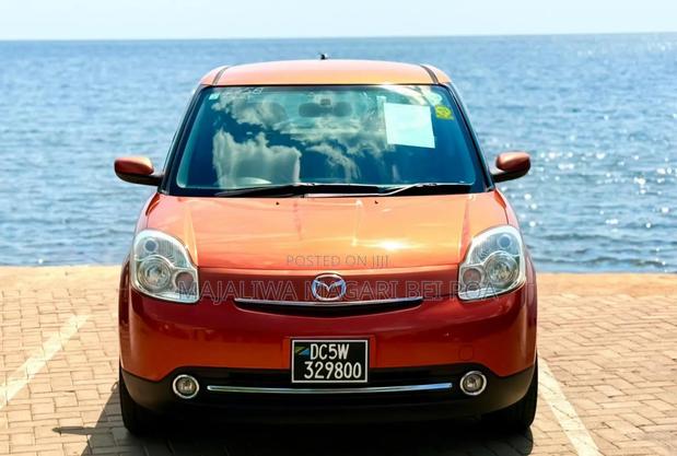 Mazda Verisa 2009 Red