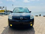 Mazda Verisa 2010 Maroon for sale