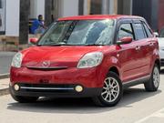 Mazda Verisa 2010 Maroon for sale
