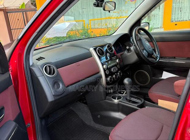 Mazda Verisa 2009 Red