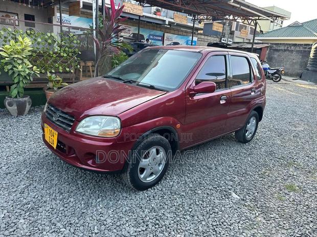 Suzuki Swift 2003 Maroon