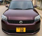 Toyota Corolla Rumion 2011 Maroon for sale